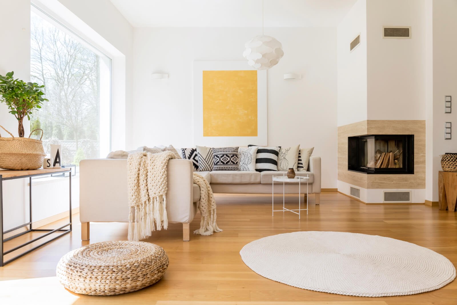 Clean, cozy living room with fireplace